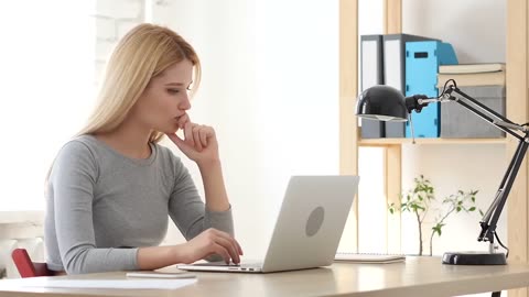 woman working on laptop laptop thinking and planning stock videos # stockfootage