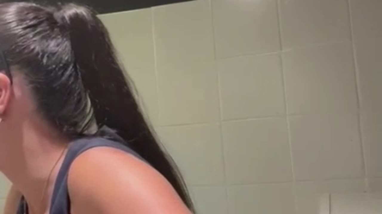 Girl Breaks Bathroom Swing Bar