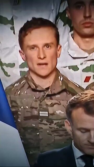 The soldier behind Macron appears to have been unprepared for the