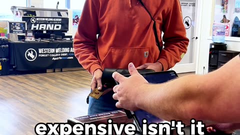 You never know when someone will help you out at Western Welding Academy's merch counter.