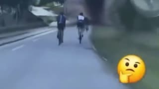 Driver purposely splashes water on bicyclist purposely blocking road. Instant Karma