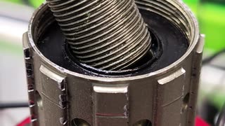 A guide to installing a freehub body on a bicycle wheel hub.