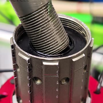 A guide to installing a freehub body on a bicycle wheel hub.