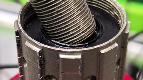 A guide to installing a freehub body on a bicycle wheel hub.