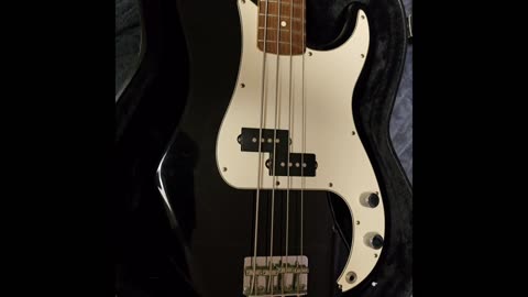 Fender Precision bass guitar.