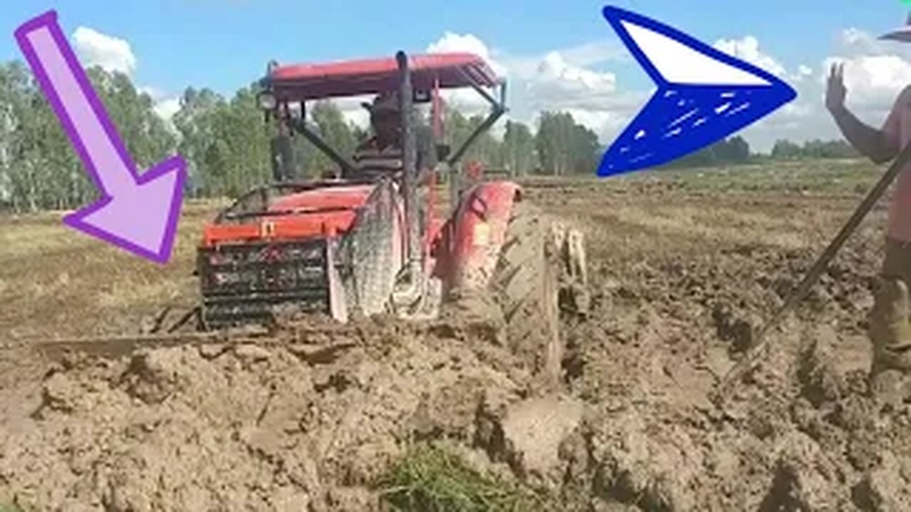 Power Of Machine Kubota M6040SU Tractor Pushing Mud