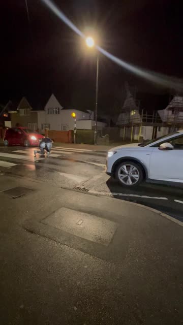 Walking Halfway Through The Pedestrian Crossing