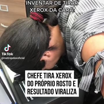 Boss takes time to photocopy his own face on the printer