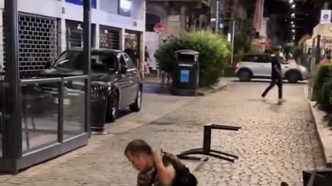 😂🚨🇮🇹 Man threatens diners in Naples Italy with a pair of scissors and gets taken out by flying furniture