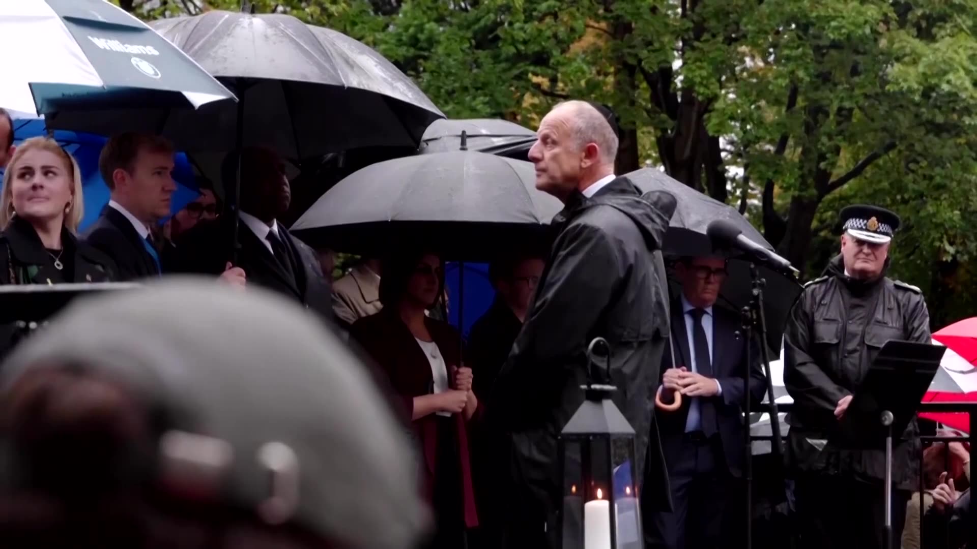 Protesters shout "shame on you" at UK deputy PM at Manchester vigil