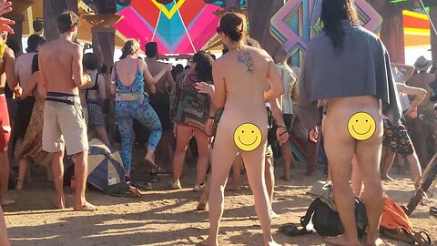 Brunette dancing naked at festival