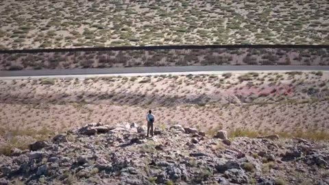 A wall of Illinois State Police officers drive back violent protesters at ICE Broadview