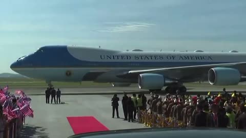 POTUS is received by a group of dancers & a flag waving crowd in Malaysia