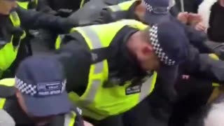 ANTIFA riot in London as police allow themselves to be pushed around.