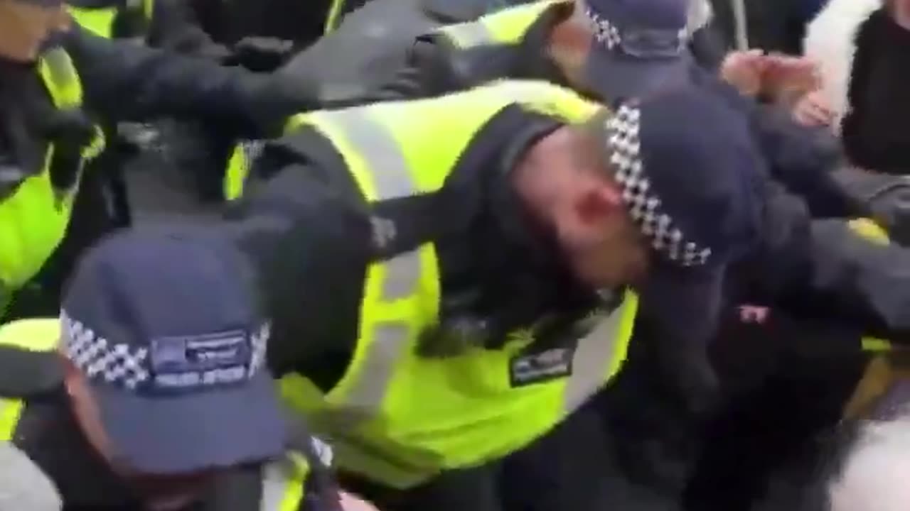 ANTIFA riot in London as police allow themselves to be pushed around.