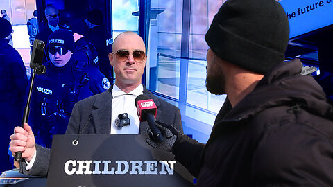 Police confront Billboard Chris in Davos