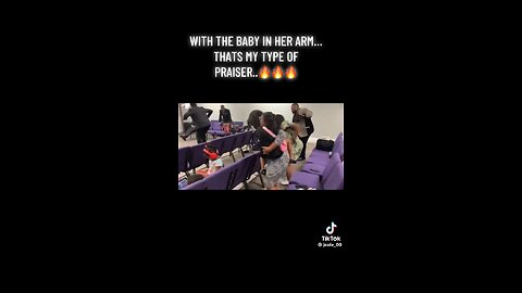 Holding a baby with a praise break 🫵🏽💃🏾🔥👶🏾🍼