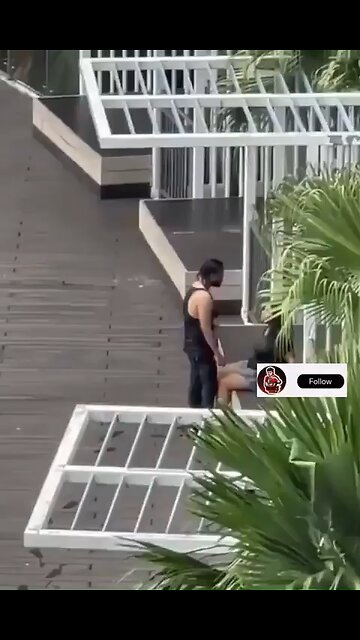 Man throws girlfriend in pool for cheating