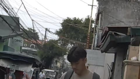 Steady Flow of Traffic on Gov. A. Pascual Street in Navotas City in the Philippines