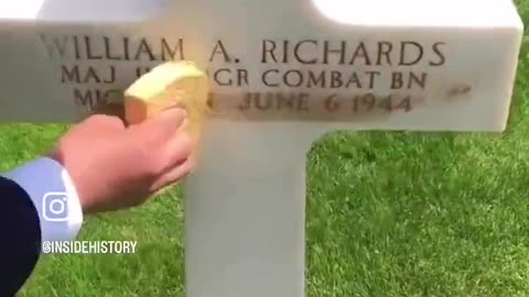 Sand from Omaha Beach rubbed into the gravestones of American soldiers