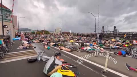 🚨 NOW: Portland leftists are blocking roads while holding a "NUDE DIE-IN" to "protest ICE"