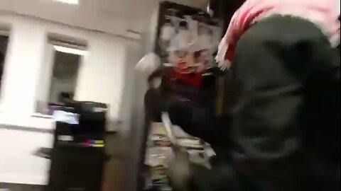 Man smashes laser guidance equipment for F35 fighter jets with a sledgehammer at a