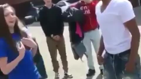 Guy Warns Girl He'll Knock Her Out. She Laughs At Him. Guy Knocks Her Out