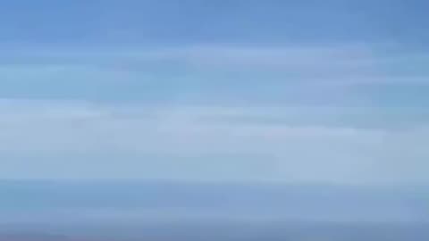 Close Encounter of Hang-Glider with a UFO or Drone