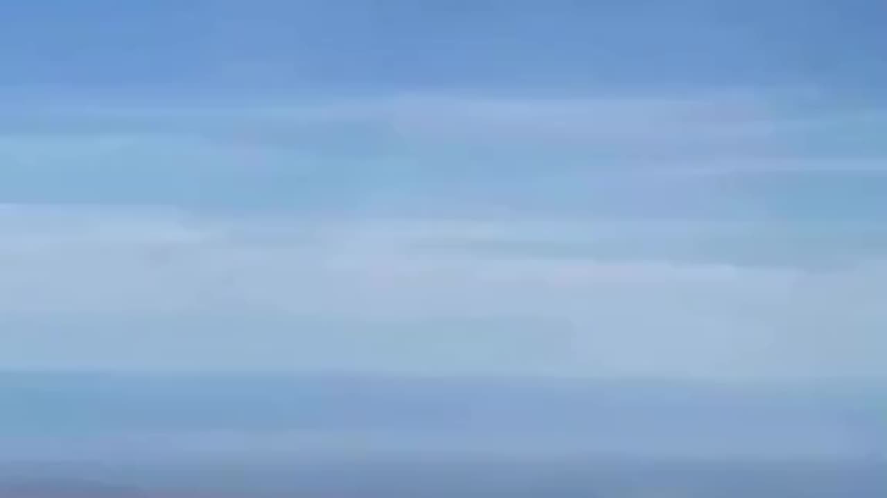 Close Encounter of Hang-Glider with a UFO or Drone