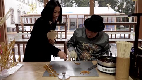 Dancing robot welcomes exhibit visitors at China House in Milan