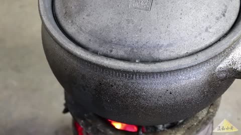 Pao meat (Meat-Stuffed Water Tart). It is the final dish served at a rural open-air banquet.