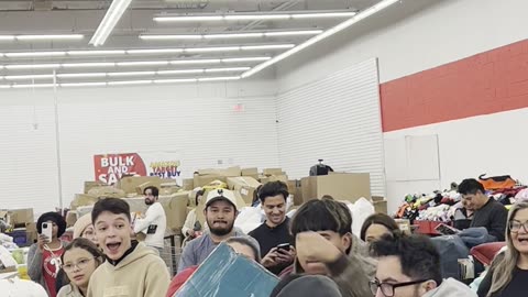 Multiple People Grab For Deeply Discounted Grill