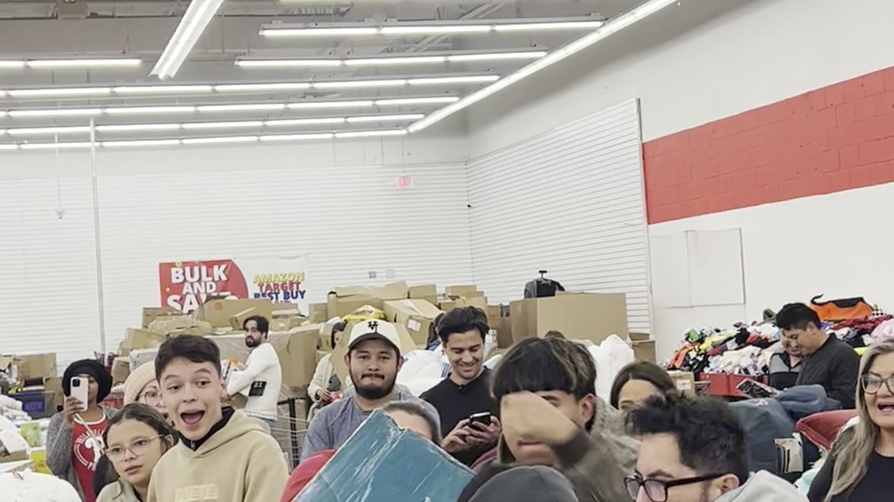 Multiple People Grab For Deeply Discounted Grill