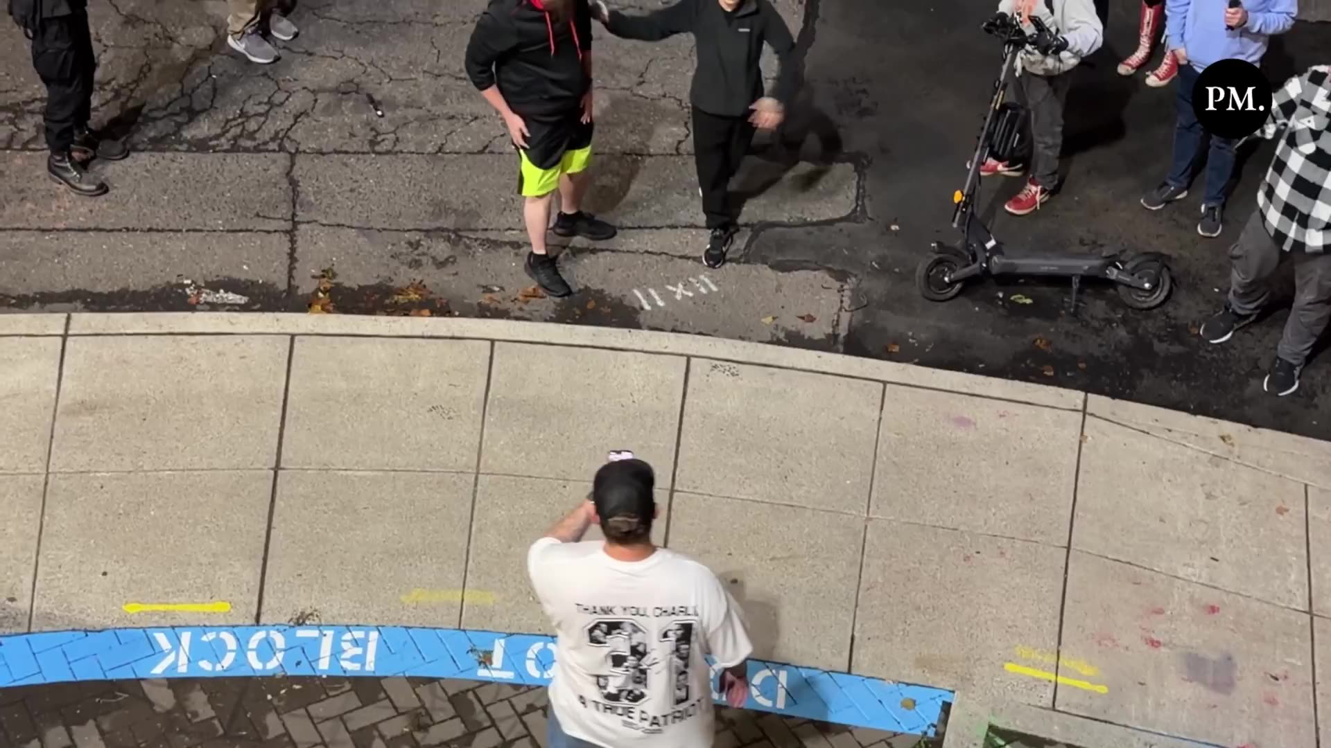 A Far-Left Militant (In the Yellow Shorts) Confronted and Attacked a Conservative Man