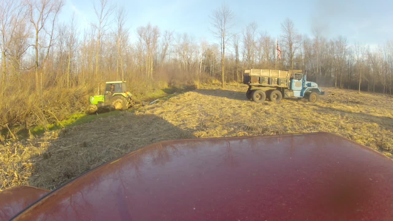 Pulling my tractor out with my 68 M51a2