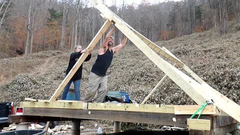 Cabin build: installing the first wall