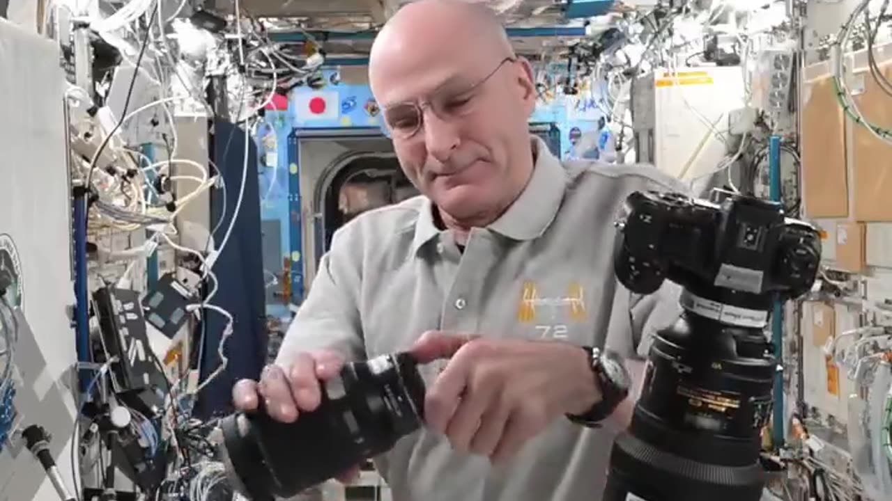 Changing the camera lens in zero gravity.