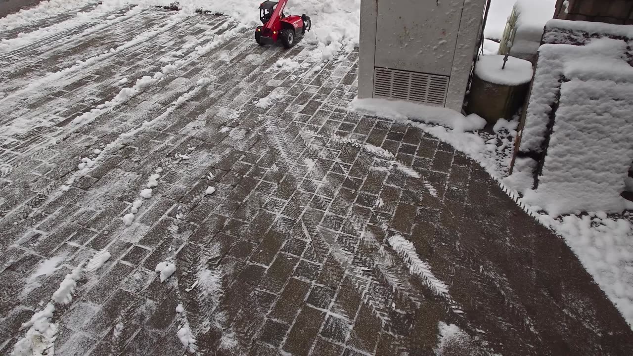 Plowing Snow in Germany with Big Scale Manitou Telehandler