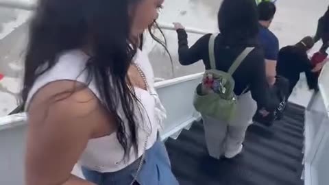 Traveler Falls Down Airplane Stairs