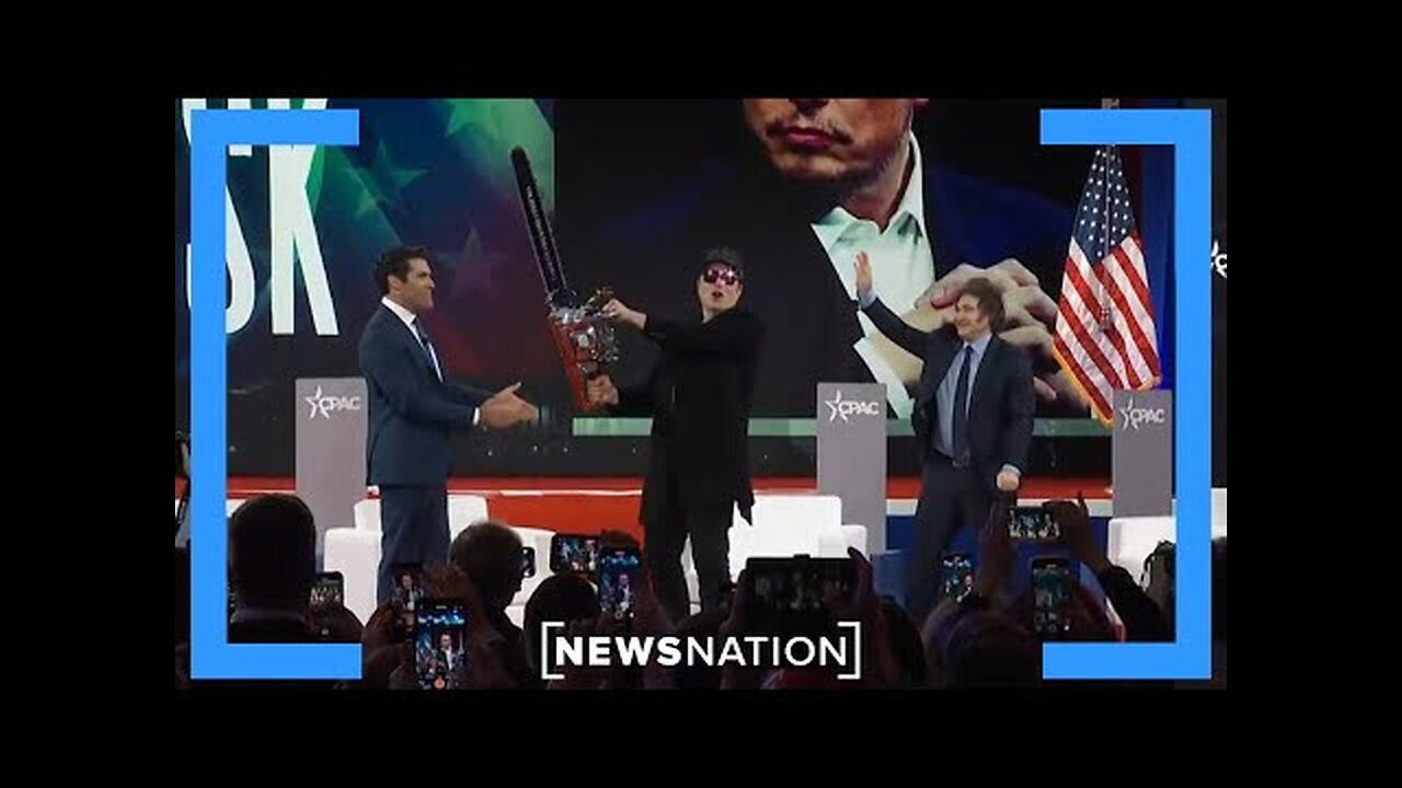 Elon Musk waves chainsaw while speaking at CPAC in DC