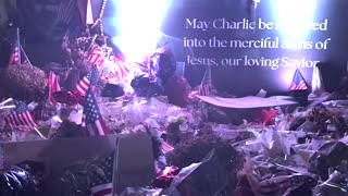 Massive Sea of Flowers Spotted Outside of TPUSA Headquarters at Night