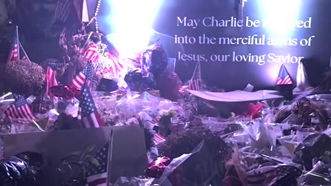 Massive Sea of Flowers Spotted Outside of TPUSA Headquarters at Night 