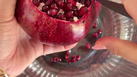 Tis The Season Pomegranate Season! This is the easiest way to de-Seed a pomegranate in my opinion.