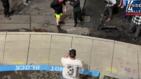 Antifa punk gets knocked the f#ck out.