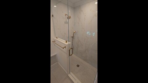 Custom Frameless Shower with Modern Brass Hardware