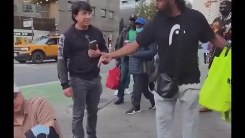 negro robs guy,gets chased and watch what happens.