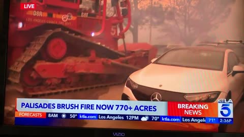 LAFD calls in bull dozer to free trapped residents from clogged roads