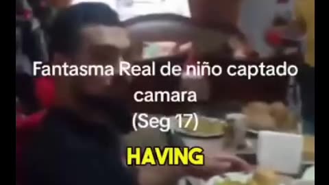 A woman was happily recording her family gathering...