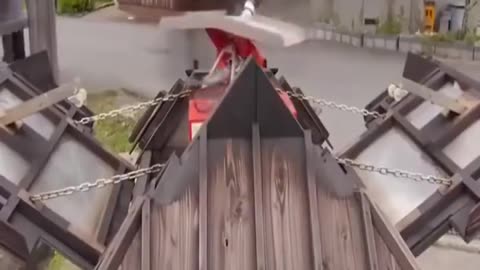 Demonstration of an automatic fire extinguishing system in the Japanese village of Kayabuki No Sato