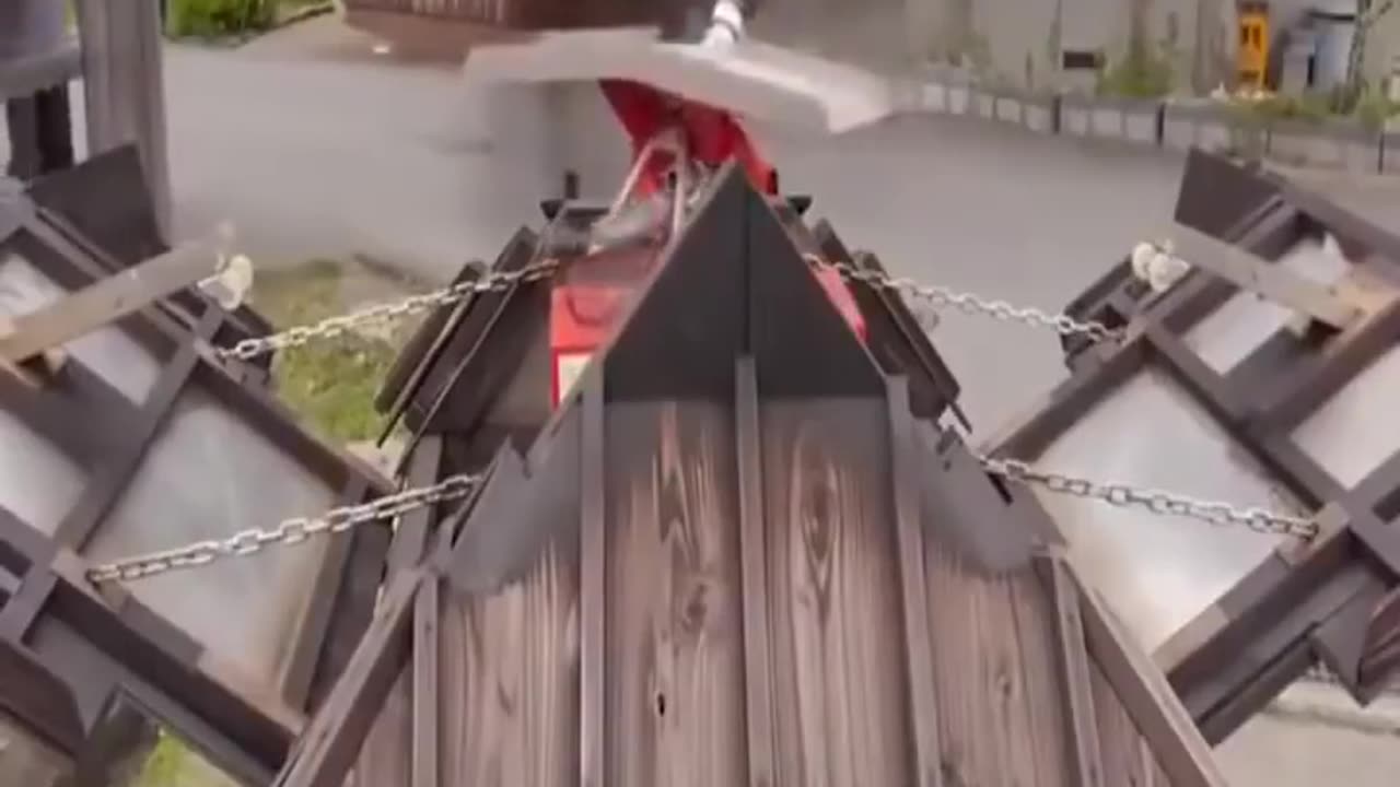Demonstration of an automatic fire extinguishing system in the Japanese village of Kayabuki No Sato